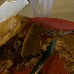 Driest/oldest tamale. Had to mix with beans to swallow