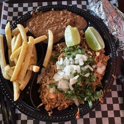 Regular plate with birria de pollo, refried beans with chorizo & chipotle and fries