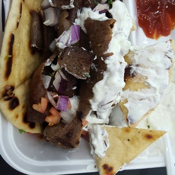 Maria D's Sub Shop - Used cut flat bread for wrap. - Pizza Near Me - Baltimore, Maryland