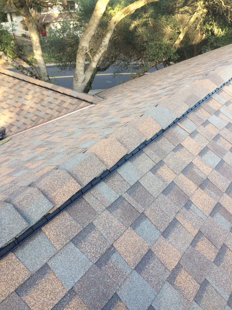 Slide of Kelly Roofing