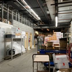 New Grand Mart - Men's room is in the stocking area