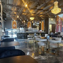 Order counter, pastry display, and seating area. Order counter, pastry display, and seating area.