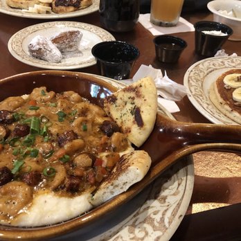 Another Broken Egg Cafe - Shrimp and grits, banana foster pancake and 1/2 Order of Biscuit Beignets - American Near Me - Raleigh, North Carolina Another Broken Egg Cafe - Shrimp and grits, banana foster pancake and 1/2 Order of Biscuit Beignets - American Near Me - Raleigh, North Carolina