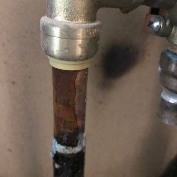 JS Remodels - The leak has already discolored the pipe. - General Contractors Near Me