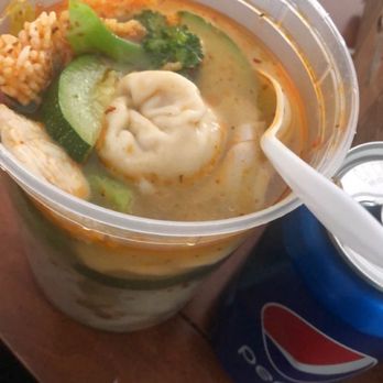 China One - a bowl of soup with a spoon in it - Chinese Near Me - Salinas, California China One - a bowl of soup with a spoon in it - Chinese Near Me - Salinas, California