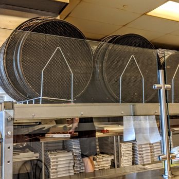 Blackjack Pizza - a man working in a restaurant kitchen - Pizza Near Me - Parker, Colorado