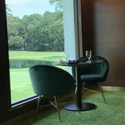 Quixote Club - Dining room with a view of the golf course.