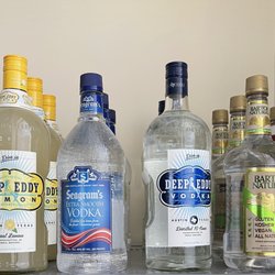 Corks & Spritz Liquors - Branded vodka straight and flavored