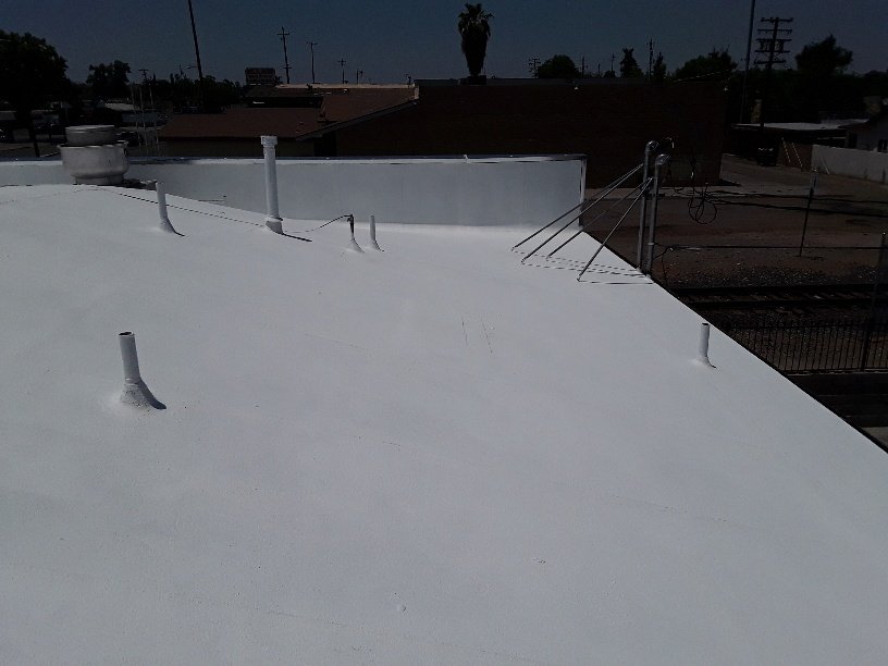 Slide of Efrain Zepeda's Rainbow Roofing