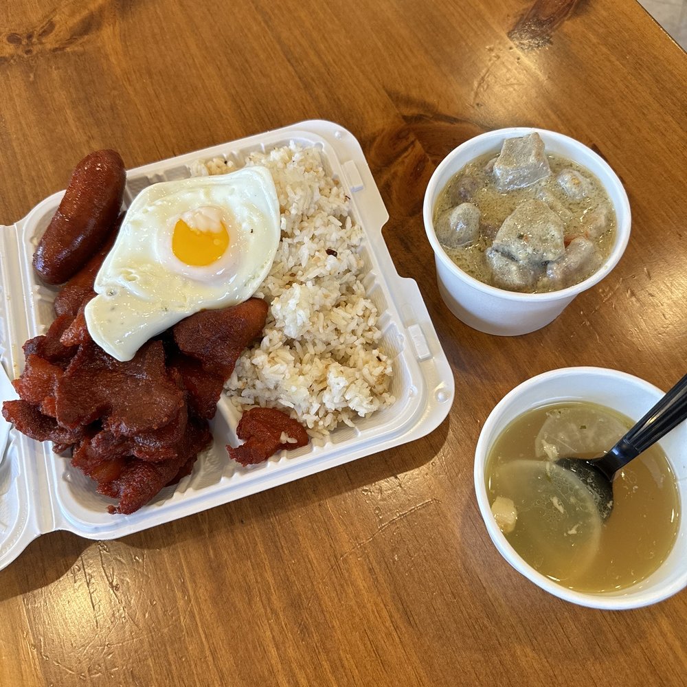 Garlic Rice, Longanisa, Tocino, Egg, and sides of pork curry and sinigang soup. Everything was hot and DELICIOUS!!
