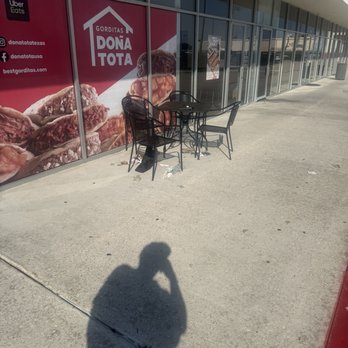 Gorditas Doña Tota - Table outside with a pile of garbage - Fast Food Near Me - Spring, Texas Gorditas Doña Tota - Table outside with a pile of garbage - Fast Food Near Me - Spring, Texas