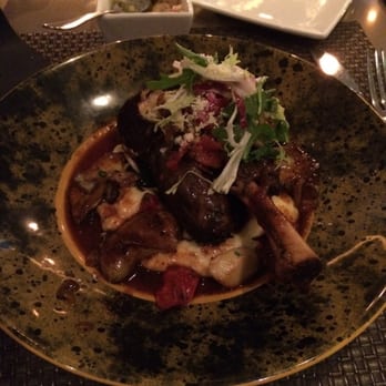 Aria - Braised lamb shank with roasted vegetables and polenta - Italian Near Me - Charlotte, North Carolina