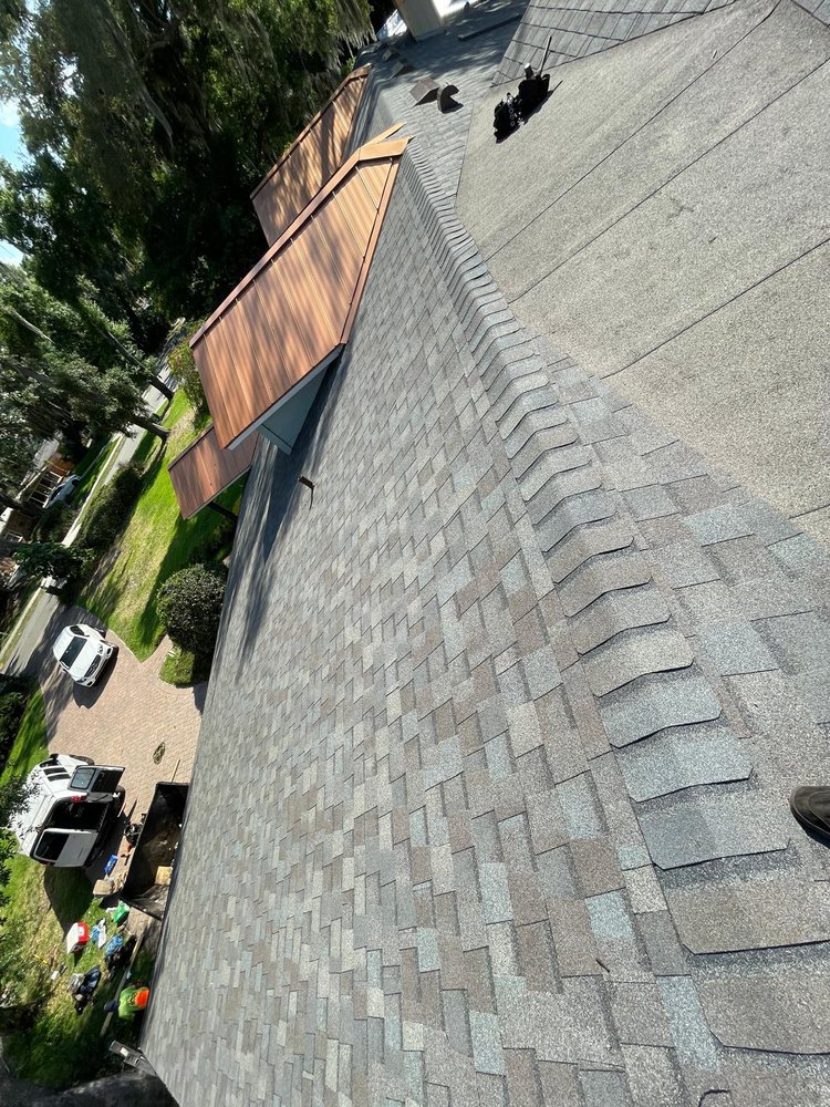 Slide of Osmin Roofing