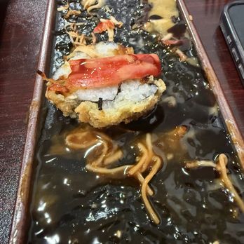 Bensu Asian Bistro - Bensu roll- spicy tuna, cream cheese, jalapeño topped with spicy crab meat, spicy mayo, and eel sauce and then deep-fried - Sushi Bars Near Me - Cushing, Oklahoma