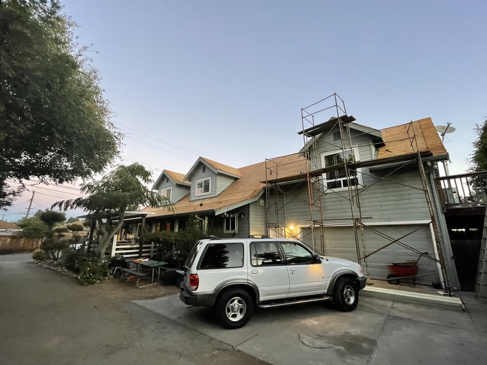 Slide of Al Jr's Roofing