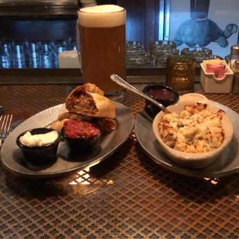 Cornish Pasty - CARNE ADOVADA & GARLIC MASHED POTATOES!! SO GOOD! The beer is a 32oz Franziskaner Hefeweizen, cold & delicious! Love this place! - British Near Me - Tempe, Arizona