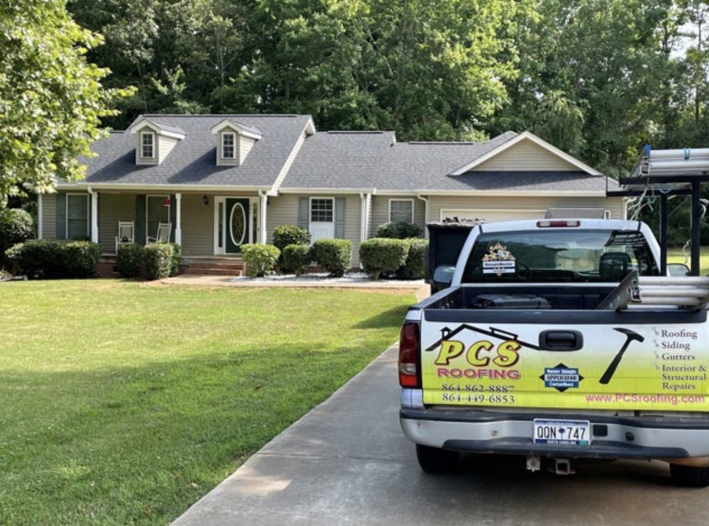 Slide of PCS Roofing