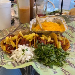 Combo: 6 tacos al pastor with half baked potato. Combo: 6 tacos al pastor with half baked potato.