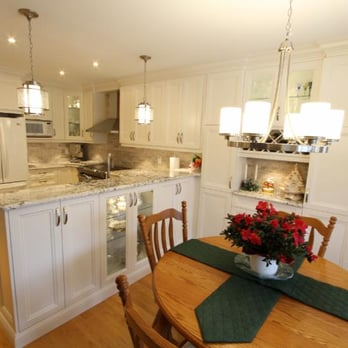 Classic Kitchens & Renovations - a kitchen with white cabinets and white appliances - General Contractors Near Me - Oshawa, Ontario Classic Kitchens & Renovations - a kitchen with white cabinets and white appliances - General Contractors Near Me - Oshawa, Ontario