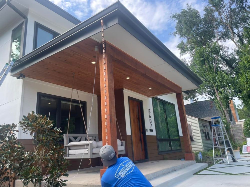 Slide of Liberty Gutters