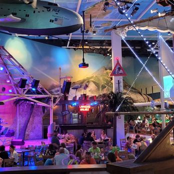 Jimmy Buffett's Margaritaville - Stage area with musicians - American Near Me - Orlando, Florida Jimmy Buffett's Margaritaville - Stage area with musicians - American Near Me - Orlando, Florida