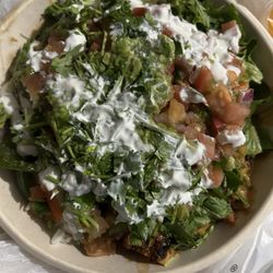 QDoba - Cilantro rice, Chochula chicken, pinto beans, corn fajita veggies guacamole sour cream cilantro pico corn and queso chili,