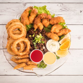 Jeremiah's Pub - Potlatch Plate featuring Wild Alaskan Seafood - Pubs Near Me - Ketchikan, Alaska Jeremiah's Pub - Potlatch Plate featuring Wild Alaskan Seafood - Pubs Near Me - Ketchikan, Alaska