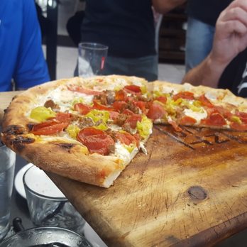 Urban Crust - Ok, partially eaten custom pizza. :) Peppers, pepperonis, and sausage - Pizza Near Me - Plano, Texas Urban Crust - Ok, partially eaten custom pizza. :) Peppers, pepperonis, and sausage - Pizza Near Me - Plano, Texas
