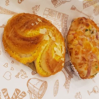 Bakery 1908 - Coconut tart on the left and ham pastry on the right. - Bakeries Near Me - Tampa, Florida