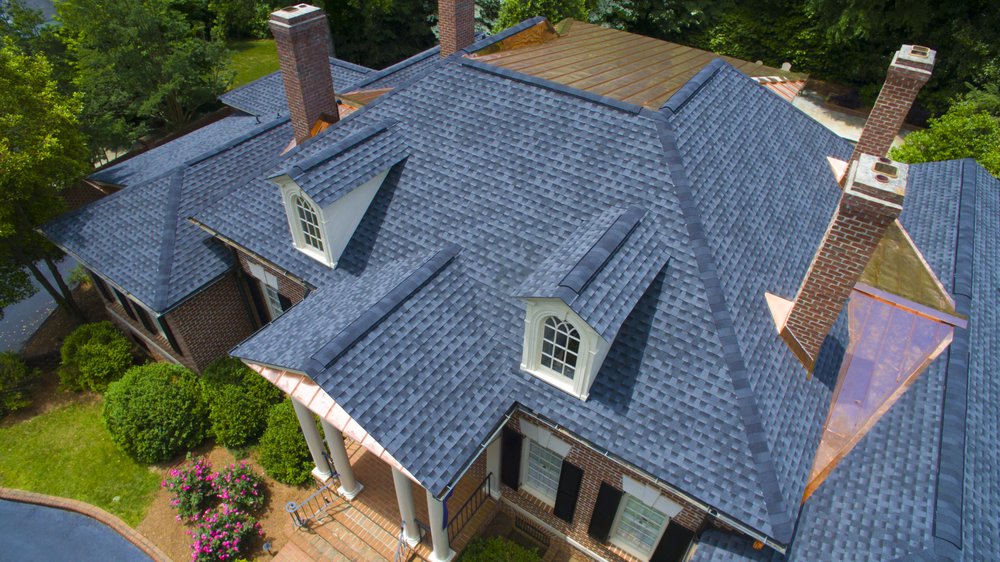 Slide of Guy Roofing