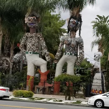 Tio's Tacos - 2 Giants made out of junk. - Mexican Near Me - Riverside, California