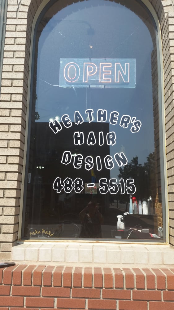 Heather's Hair Design & Spa Logo