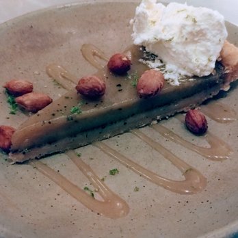 Tusk - Black Lime Pie, with salted peanuts, fresh cream and fenugreek caramel - Middle Eastern Near Me - Portland, Oregon Tusk - Black Lime Pie, with salted peanuts, fresh cream and fenugreek caramel - Middle Eastern Near Me - Portland, Oregon