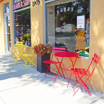 Spice Restaurant - colorful chairs and tables outside - Caribbean Near Me - Evanston, Illinois