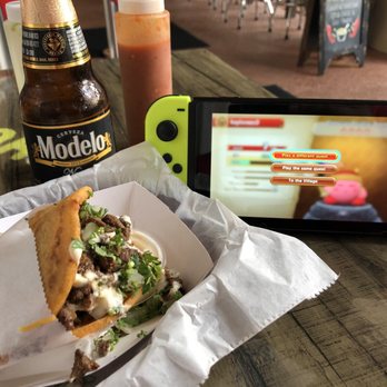 Taco Chula - Enjoying a gordita outside. Great vibes. - Mexican Near Me - Palm Beach Gardens, Florida Taco Chula - Enjoying a gordita outside. Great vibes. - Mexican Near Me - Palm Beach Gardens, Florida