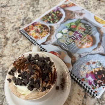 Harvest Kitchen & Bakery - Hot chocolate (whole milk) with whip cream and chocolate shavings - Breakfast & Brunch Near Me - Katy, Texas Harvest Kitchen & Bakery - Hot chocolate (whole milk) with whip cream and chocolate shavings - Breakfast & Brunch Near Me - Katy, Texas