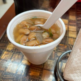 Taco Landia - a bowl of soup with a spoon in it - Mexican Near Me - Mercedes, Texas Taco Landia - a bowl of soup with a spoon in it - Mexican Near Me - Mercedes, Texas