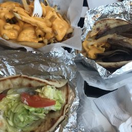 Chicken gyro, cheese steak gyro, large cheese fries Chicken gyro, cheese steak gyro, large cheese fries