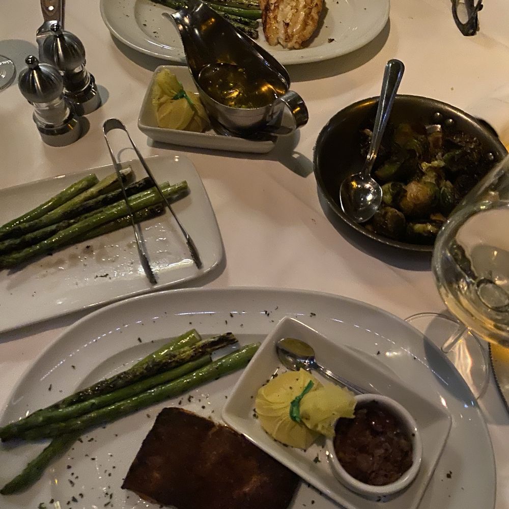 Mastro's Steakhouse - Jumbo Lobster Tail, Norwegian Cold Salmon (Blackened), Roasted Brussels Sprouts and Asparagus - Steakhouses Near Me - Chicago, Illinois Mastro's Steakhouse - Jumbo Lobster Tail, Norwegian Cold Salmon (Blackened), Roasted Brussels Sprouts and Asparagus - Steakhouses Near Me - Chicago, Illinois