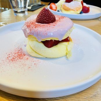 Flipper’s - Strawberry Flipper in front. Soufflé Fresh Fruit Flipper in the back. - Pancakes Near Me - New York, New York