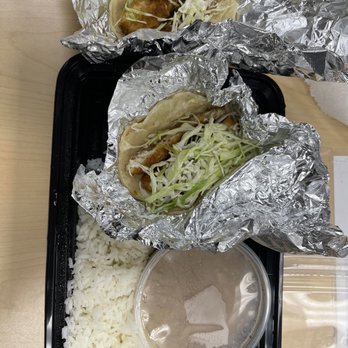 Baja Fish Tacos - Two fish tacos with rice and beans. ToGo - Seafood Near Me - Norco, California