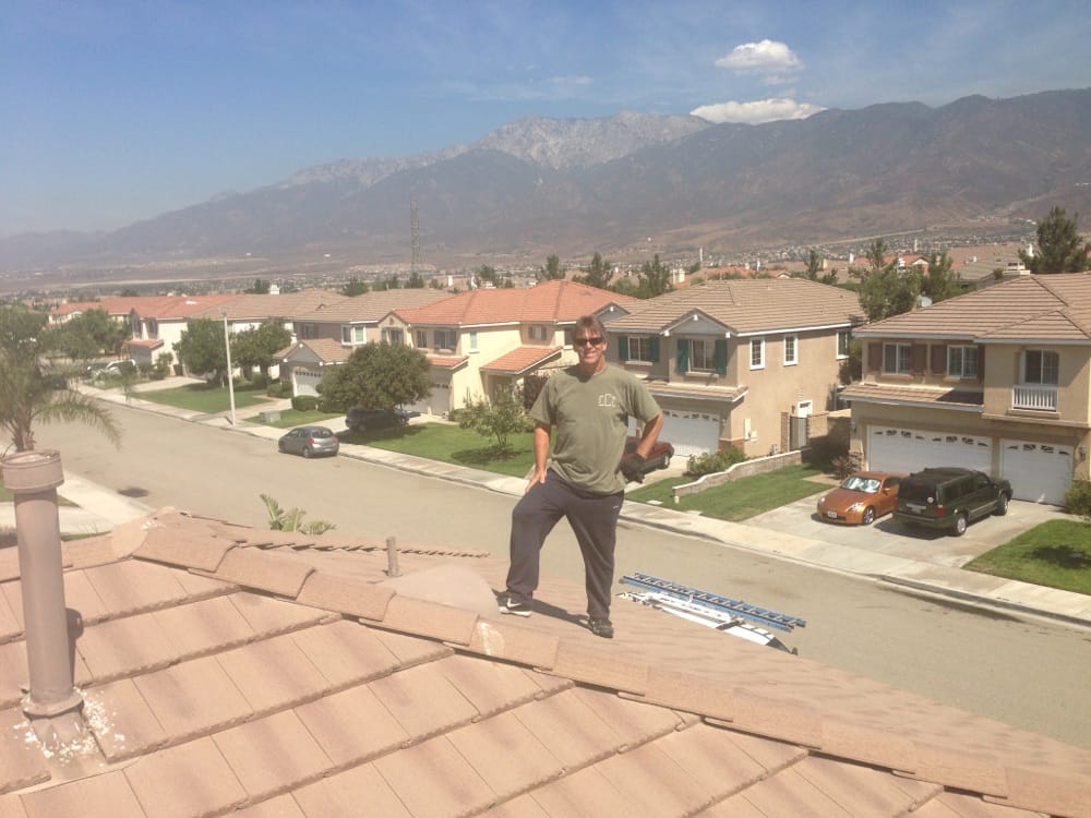 Slide of Adams Roofing