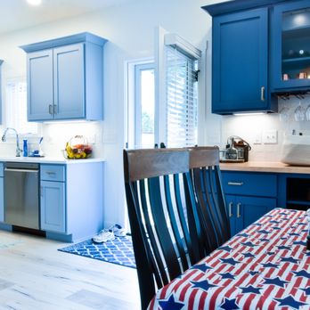 Homes by JICI - a kitchen with blue cabinets - General Contractors Near Me - Angola, Indiana Homes by JICI - a kitchen with blue cabinets - General Contractors Near Me - Angola, Indiana
