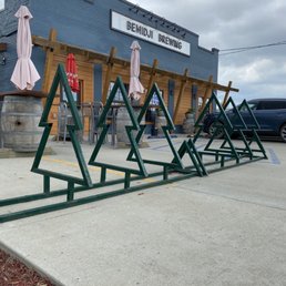 a row of tables and umbrellas