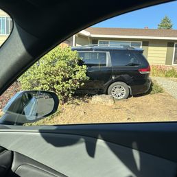 Car stuck in our front yard