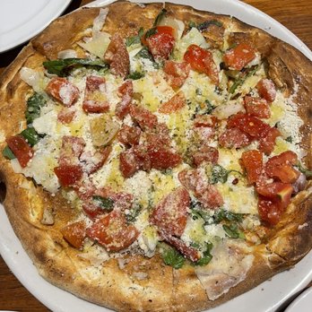 Spuntino Pizzeria - Pizza bruschetta (under cold topping pizzas) - Italian Near Me - Temecula, California Spuntino Pizzeria - Pizza bruschetta (under cold topping pizzas) - Italian Near Me - Temecula, California
