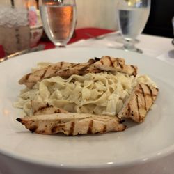 Ristorante Renato - Fettuccine Alfredo with chicken. My daughter got this and the pasta was cooked perfectly!