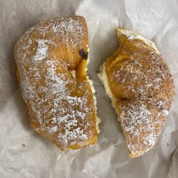 a half eaten pastry a half eaten pastry