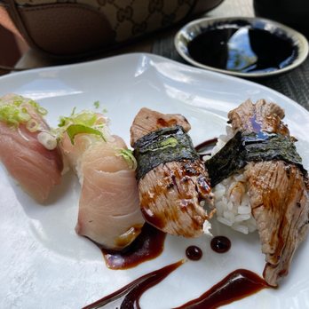 Sushi Hachi - Yellowtail nigiri (left) and nigiri wagyu (right) - Sushi Bars Near Me - Washington, DC, District of Columbia Sushi Hachi - Yellowtail nigiri (left) and nigiri wagyu (right) - Sushi Bars Near Me - Washington, DC, District of Columbia