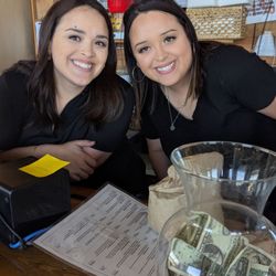 The Best of Texas Food and Wine Festival - That's Emilee and a coworker getting ready to assist the customer